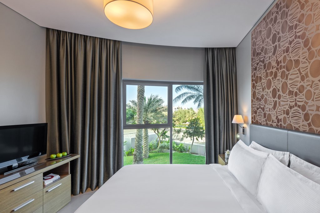 Majestic Arjaan by Rotana - Tap to explore photos
