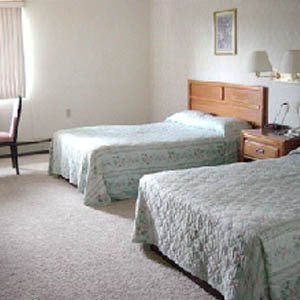 Brass Bell Inn & Suites - Chesaning, MI