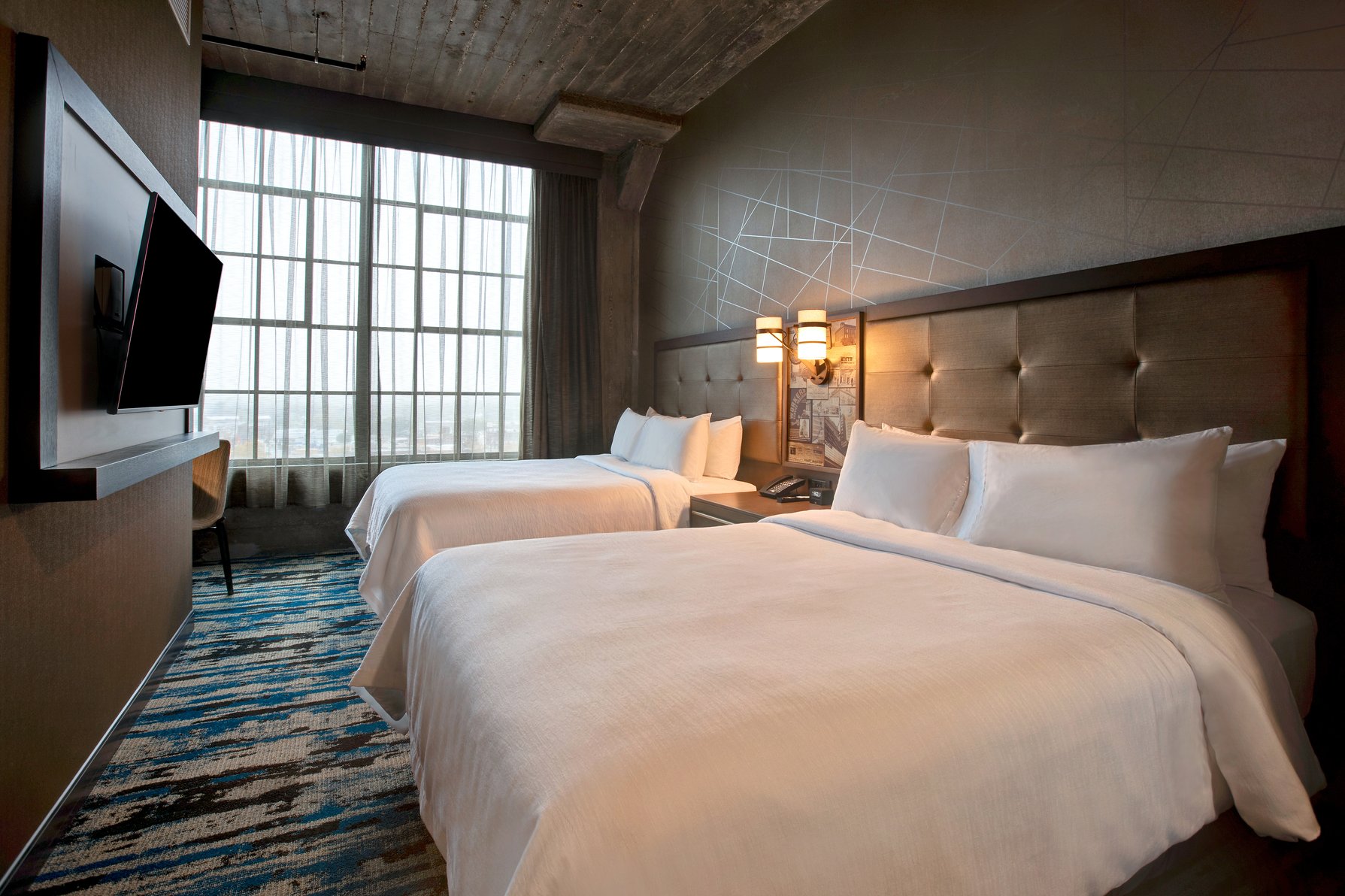 Embassy Suites by Hilton Rockford Riverfront - Tap to explore photos