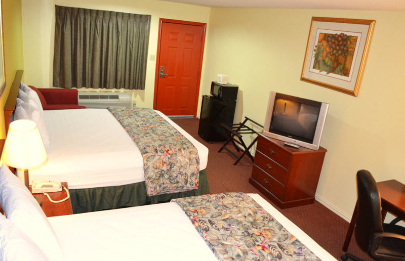 Executive Inn & Suites - Magnolia, TX