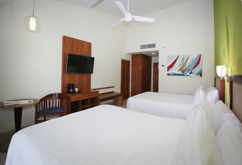 Holiday Inn HUATULCO - Tap to explore photos