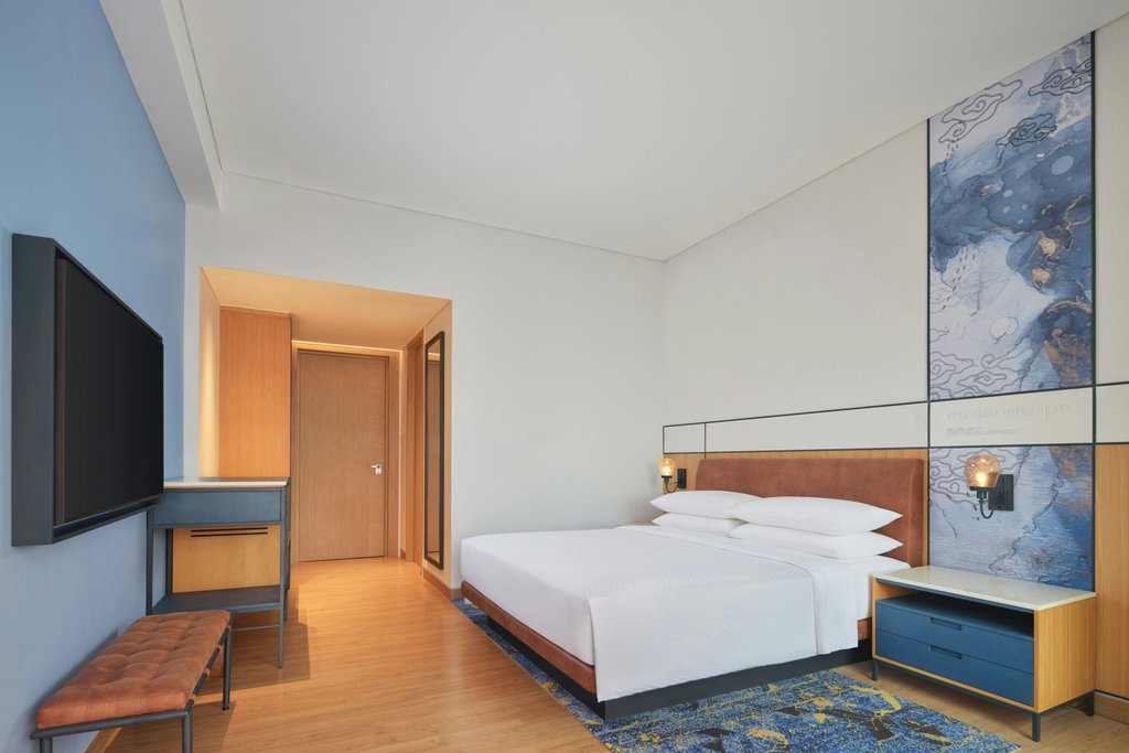 Four Points By Sheraton Bintan, Lagoi Bay Room Type - Deluxe Garden King, Garden, 1 King, Garden view, Balcony Four Points By Sheraton Bintan, Lagoi Bay Room Type - Deluxe Garden King, Garden, 1 King, Garden view, Balcony