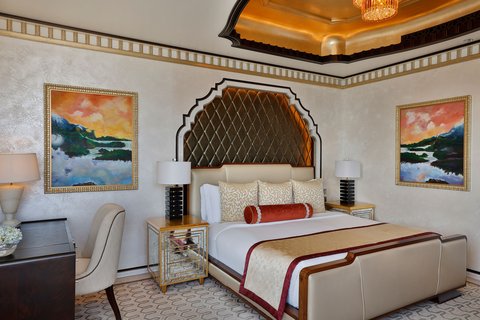 Abu Dhabi suite bedroom with art paintings