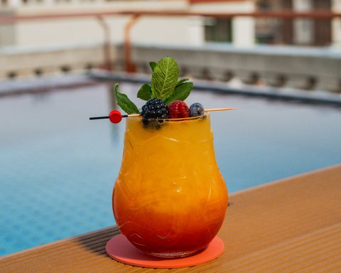 Fresh and sweet cocktail at our rooftop pool bar Terraza de Vivi