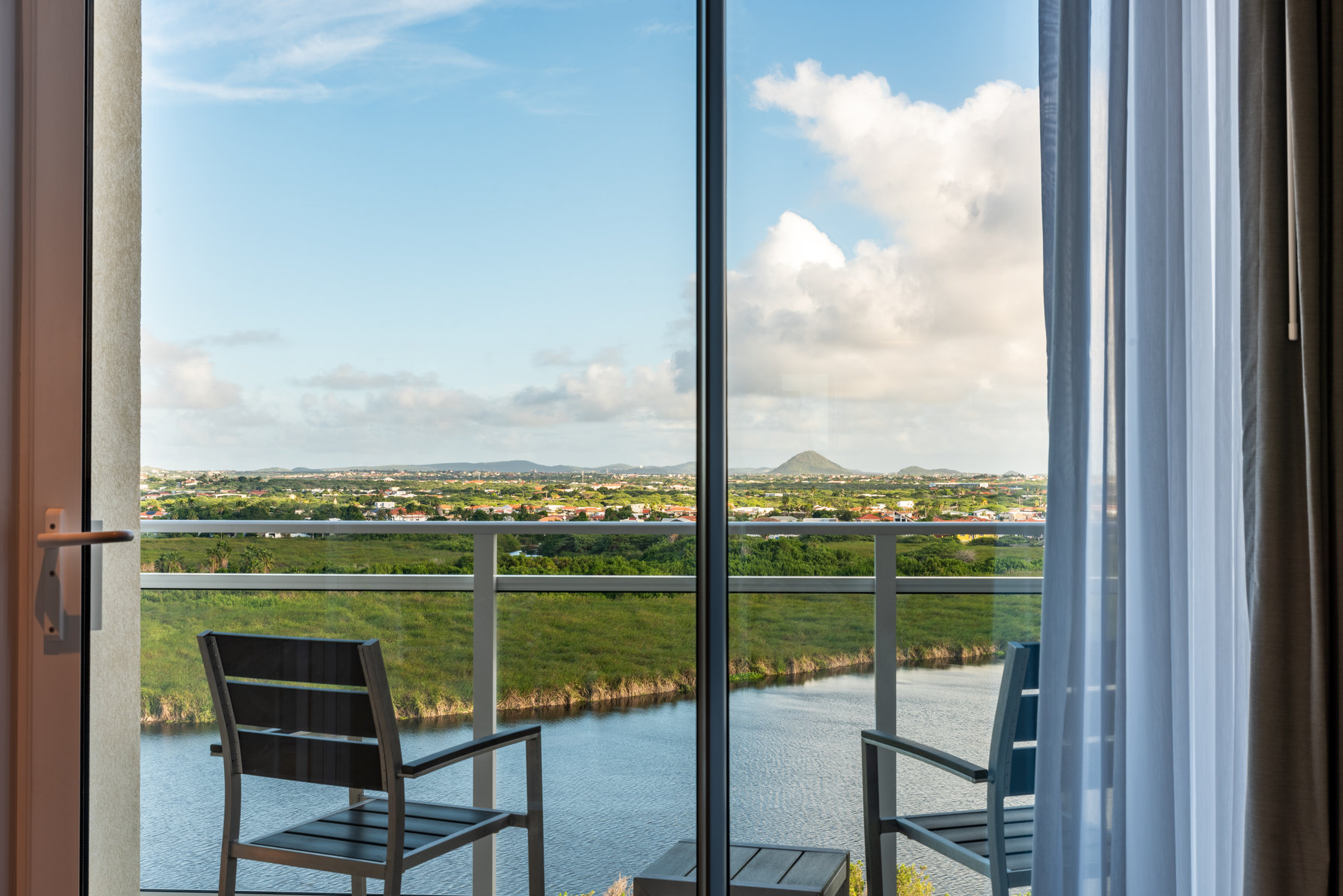 Embassy Suites by Hilton Aruba Resort Room Type - 2 QN 1 BDR STE SUNRISE VW