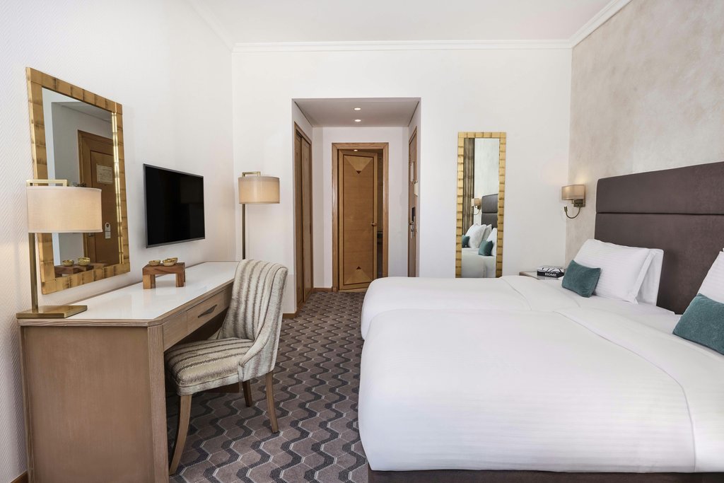 Gefinor Rotana Room Type - Classic Room/Twin Bed/35sqm/WiFi/LCD TV City View/Balcony/AC/Bath n Shower/Safe