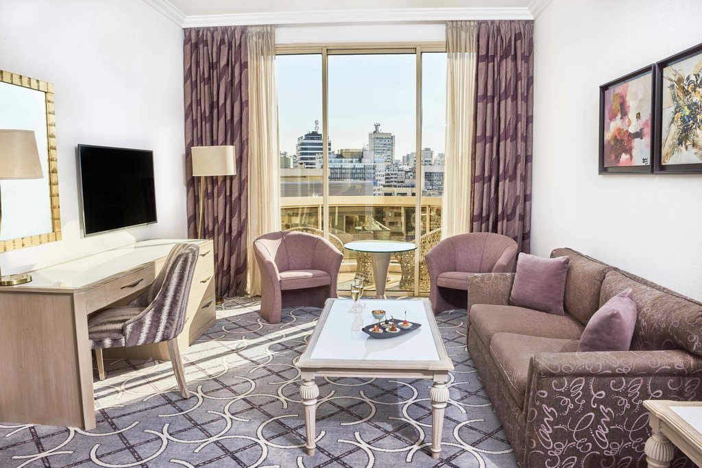 Gefinor Rotana Room Type - Premium Suite/King Bed/52sqm/WiFi/LCD TV Sea or CityView/Balcony/Living Room/Bath Gefinor Rotana Room Type - Premium Suite/King Bed/52sqm/WiFi/LCD TV Sea or CityView/Balcony/Living Room/Bath