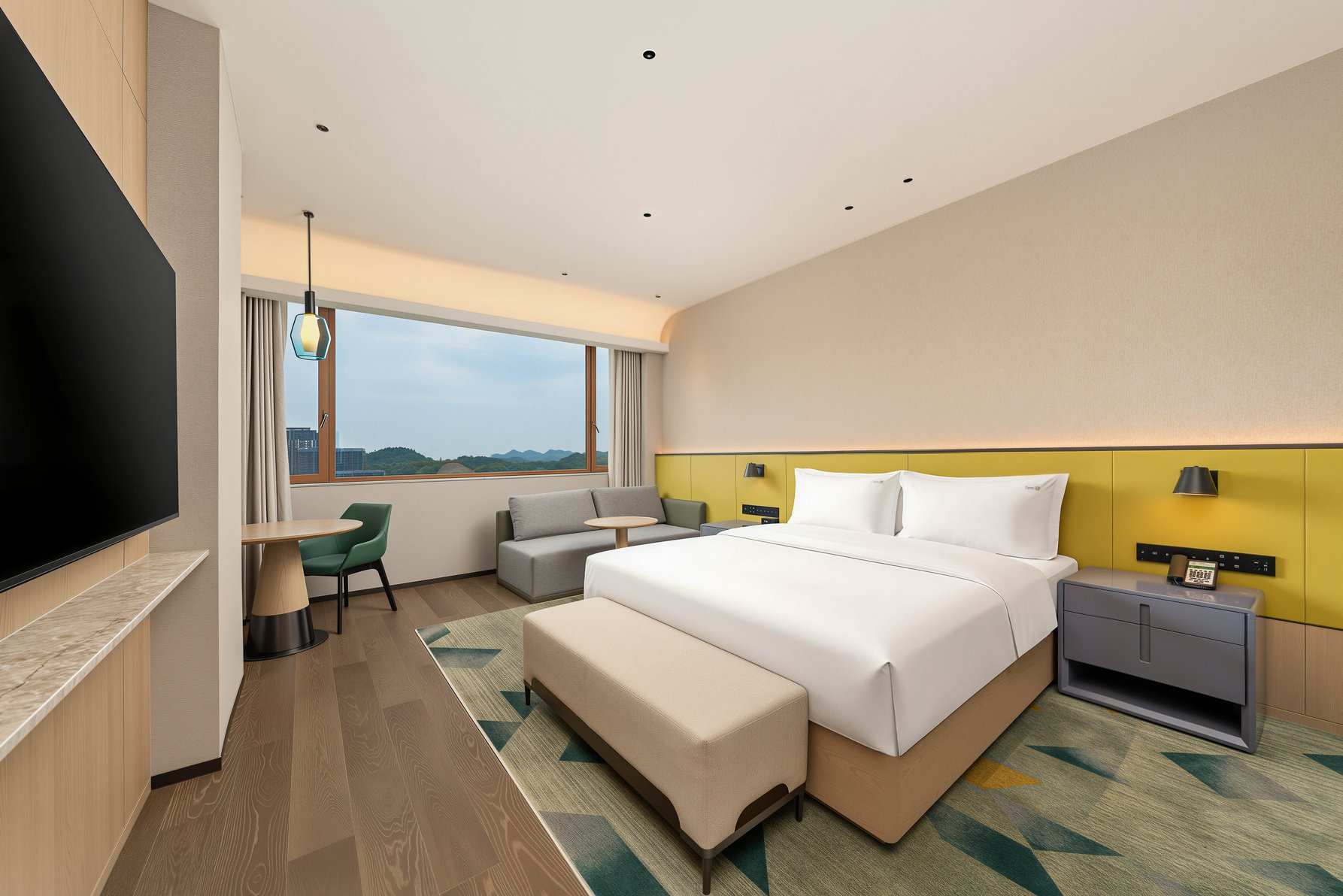 Holiday Inn JINGDEZHEN by IHG Room Type - 1 King 1 Bedroom Suite Living Dining and Kitchen Area