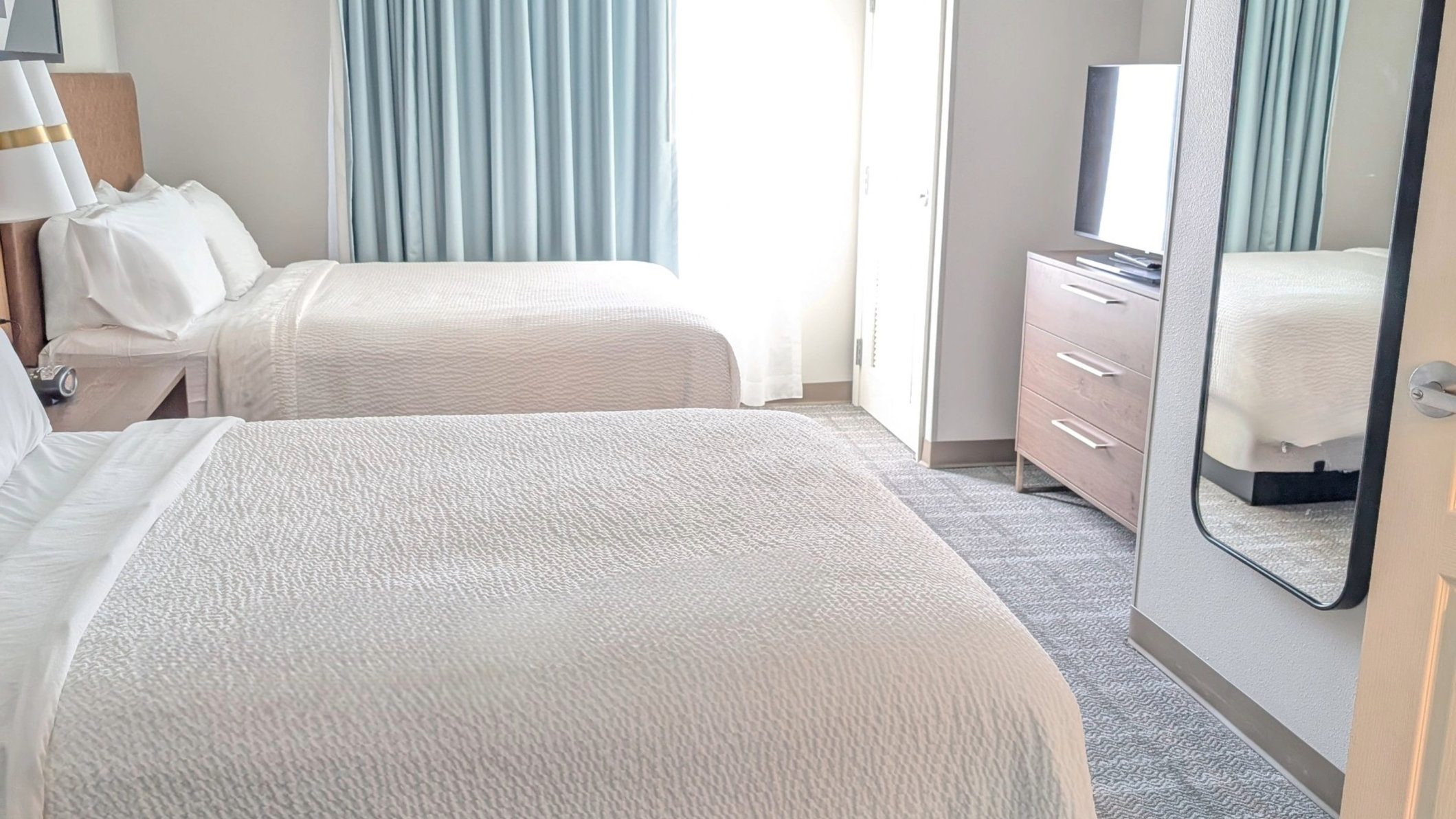 Staybridge Suites BISMARCK, an IHG hotel Room Type - 1 King 2 Queen 2 Bedroom Suite Sofa Bed