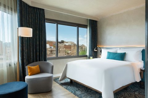 Prestige Corner Guest Room with Queen Bed
