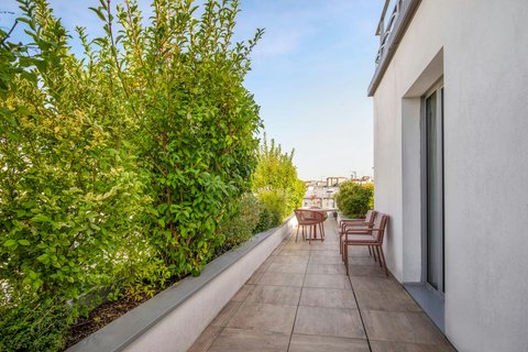 Rooftrop terrace, plants and furniture