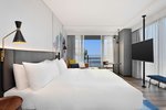 Savvy, Larger Guest room, 1 King, Garden view, Corner room, Away from elevator