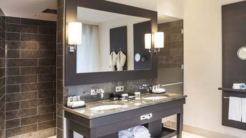 Spacious bathroom in every suite