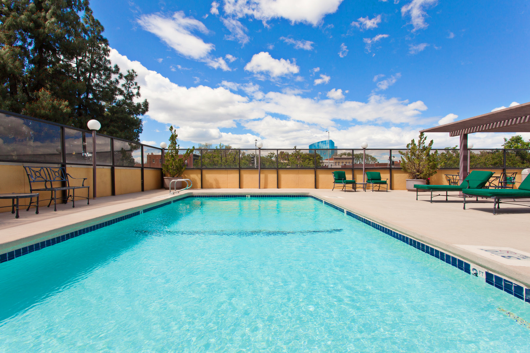 Take A Dip In Our Refreshing Outdoor Pool And Soak In The Sunshine
