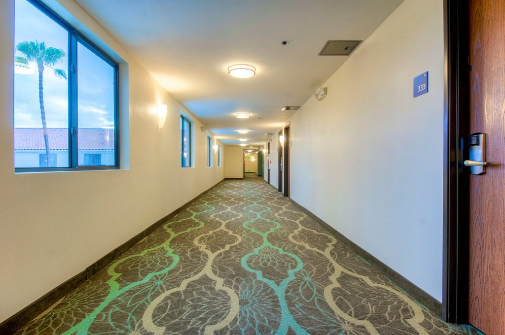 Quiet hallway leading to your room