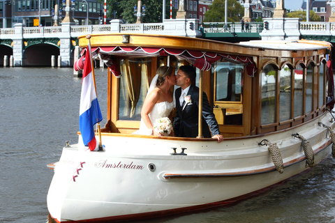 Wedding arrival with classic saloon boat