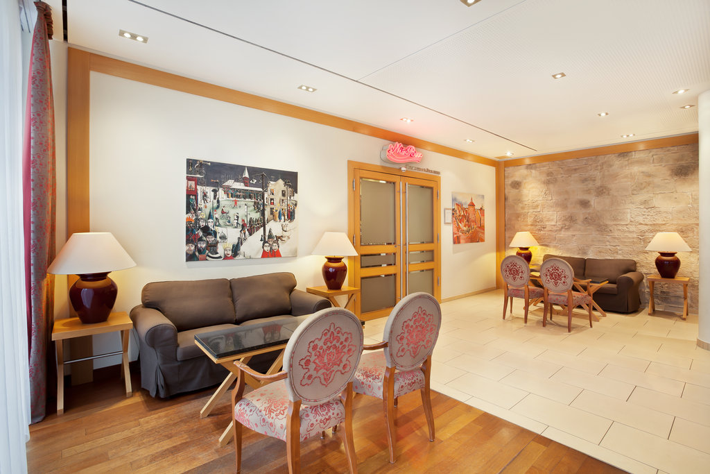 Comfortable seating and striking art in the hotel lobby.