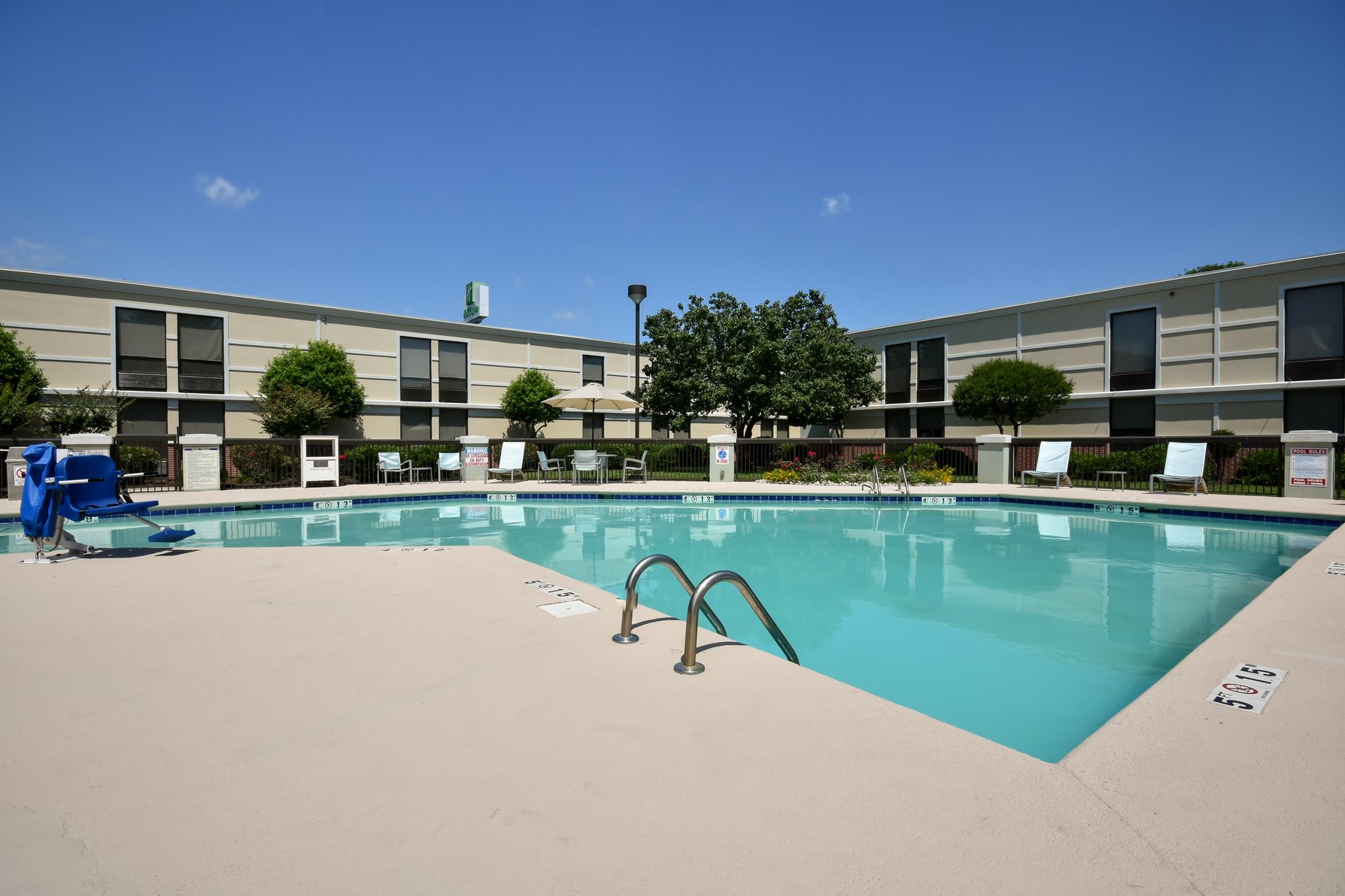 Nestled in Our Courtyard Seasonal Outdoor Swimming Pool 
