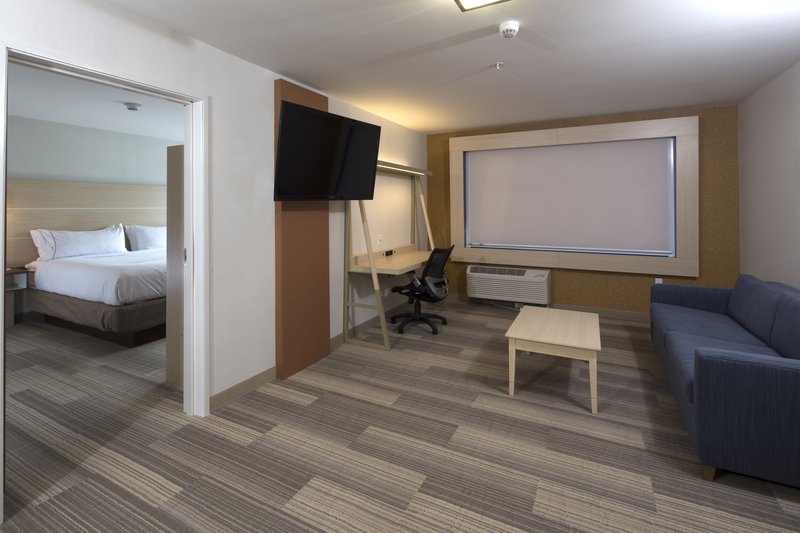 Relax in our oversized suite featuring private living room