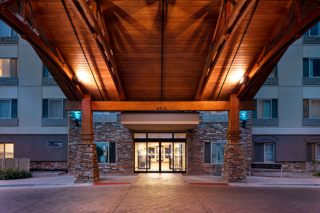 Our complimentary airport shuttle picks up in front of our lobby.