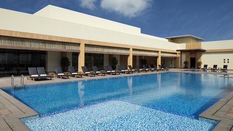 Health Club Swimming Pool on the top floor with a sky view