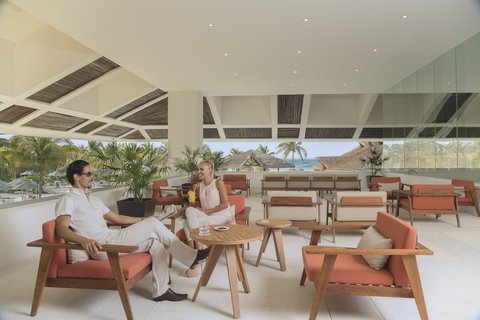 Relax with a drink on the Club Floor Lounge.