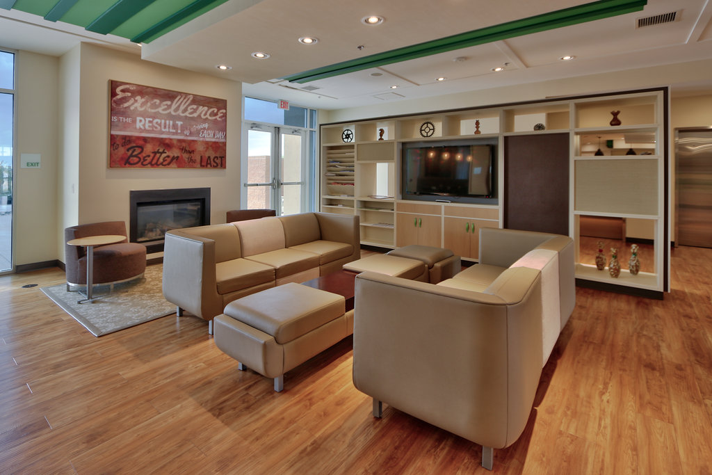 Enjoy a cold beverage by the fire in our Oasis Bar & Grill Lobby.