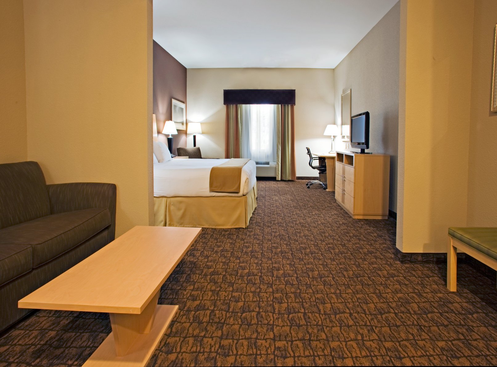 Holiday Inn Express Hotel and Suites Borger Room Type - 1 King Suite Communications Mobility Accessible Tub Holiday Inn Express Hotel and Suites Borger Room Type - 1 King Suite Communications Mobility Accessible Tub