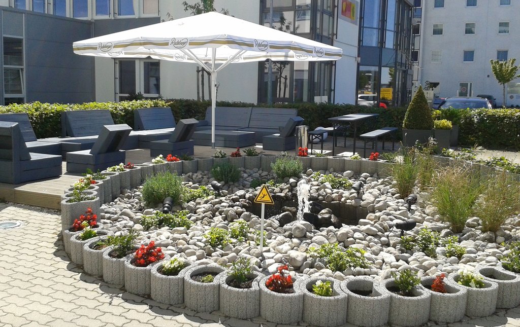 Dine, unwind, meet or work on our relaxing outdoor terrace