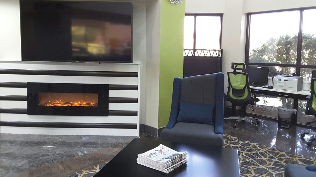 Fireplace in Lobby - Holiday Inn Express Lawrenceville, GA