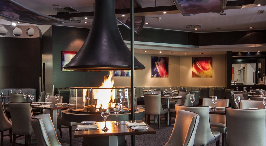Cozy comfort around the restaurant fire