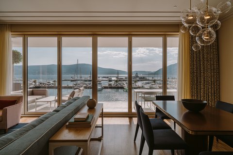 Stay in Aqua/Baia suite and  sweeping views of marina and bay
