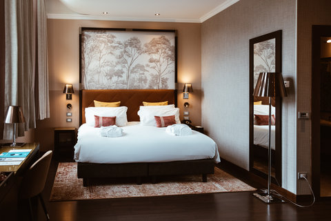 Relax on our plush beds after a long day spent sightseeing