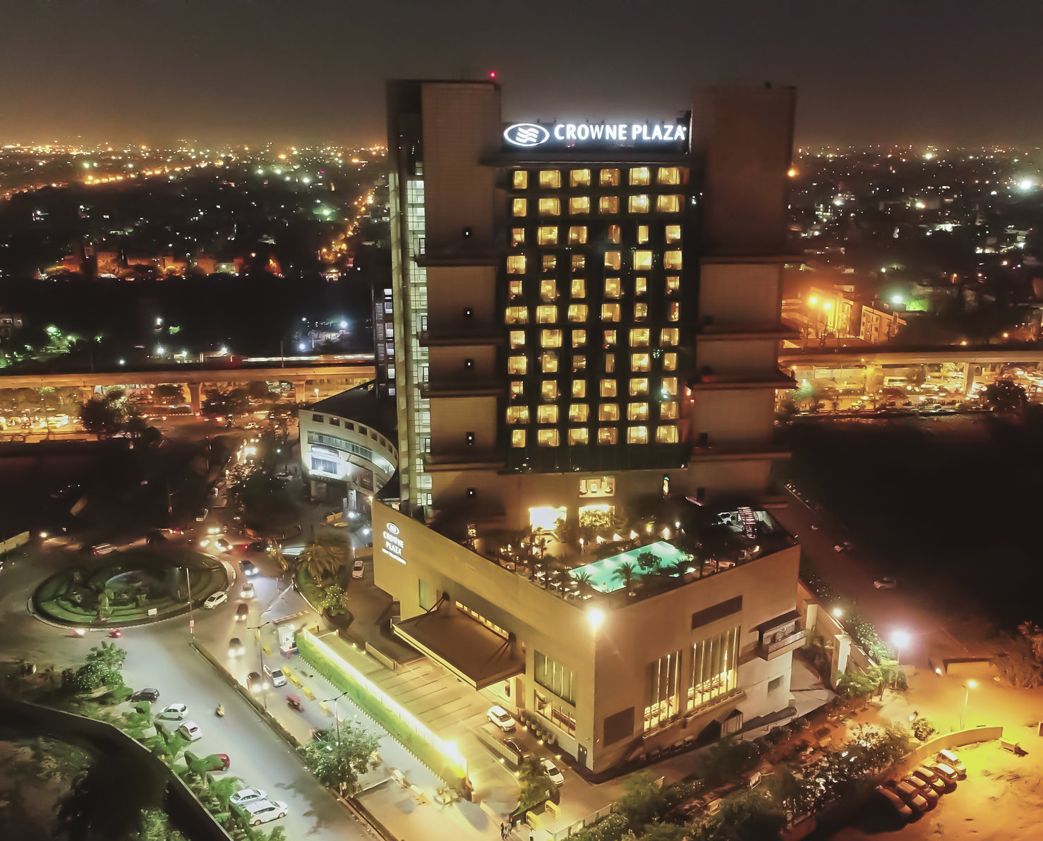 Crowne Plaza New Delhi Rohini, an IHG Hotel - Aerial night view of the Hotel with a city landscape