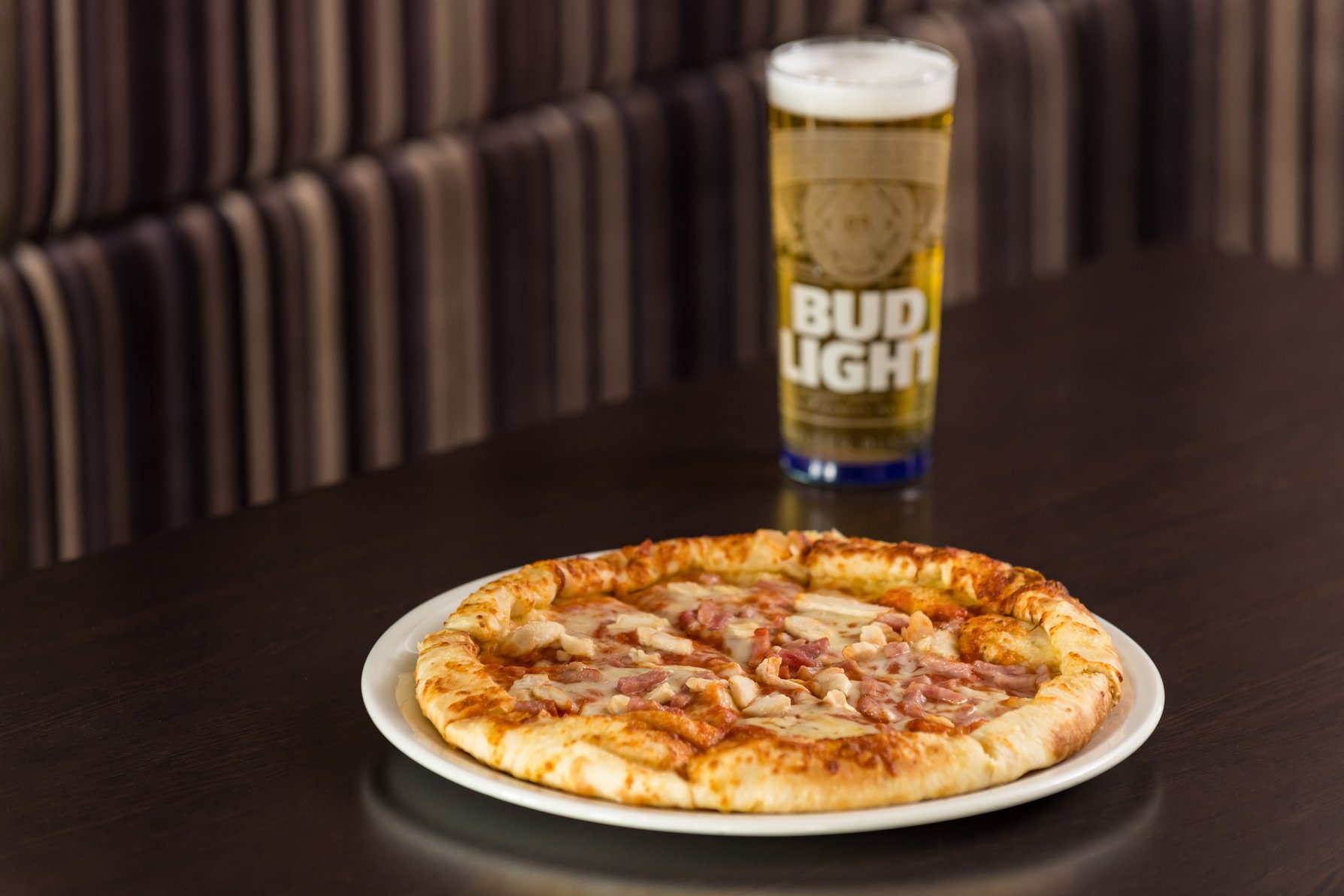 Treat yourself to a pizza and pint after a hard day's work!