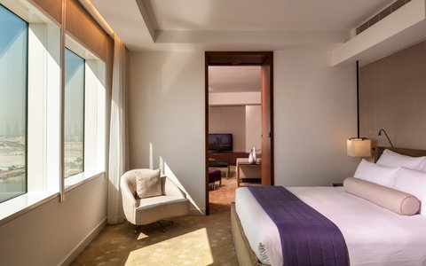 A comfortable suite with ample space and natural lighting