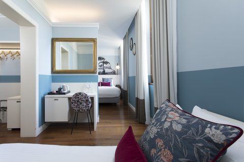 Premium Room with extra bed. Decorative pillows & items removed
