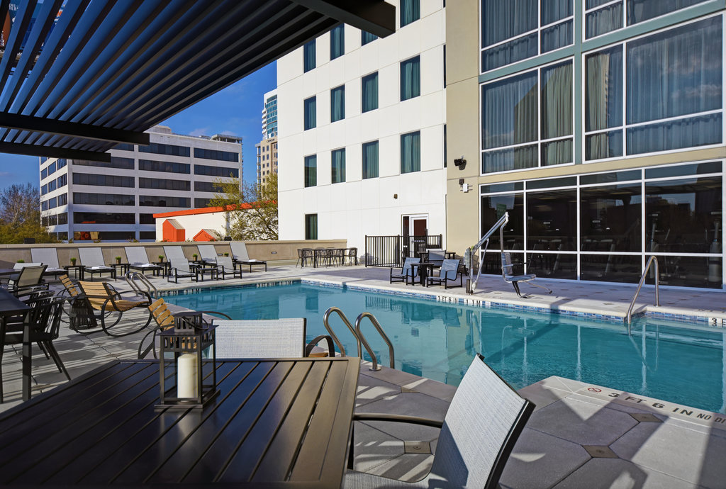 Covered lounging area by our outdoor heated pool