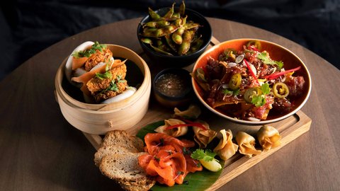 Enjoy Pan Asian streetfood at Off The Wall bar.