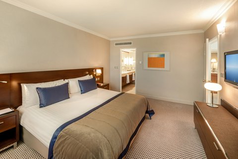 A separate bedroom within the suite