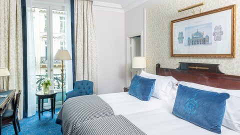 Twin beds with balcony