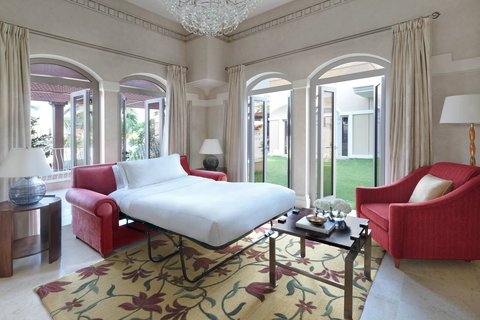 Suite con jardín y casa con jardín - Sala de estar con sofá cama