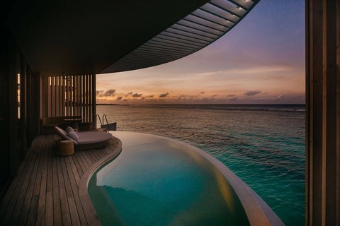 Villa de un dormitorio con piscina frente al mar