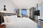 Savvy, Larger Guest room, 1 King, Garden view, Corner room, Away from elevator
