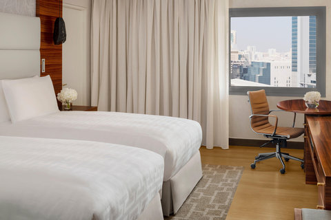 Twin bedroom with city view with connecting room option