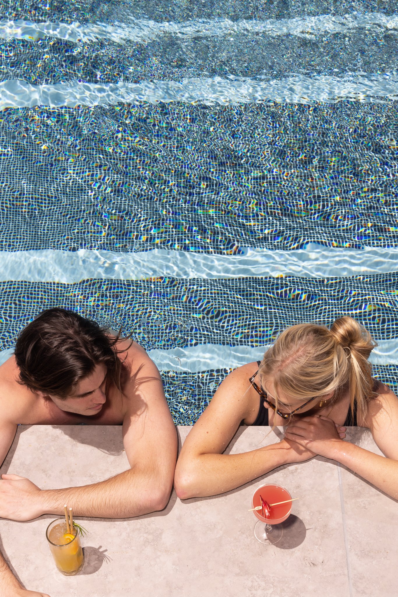 drinks by rooftop pool