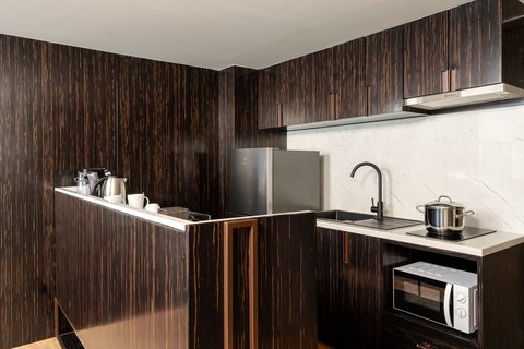 With separate living room, bedroom and kitchenette
