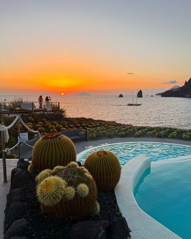 Sunset by the infinity pool