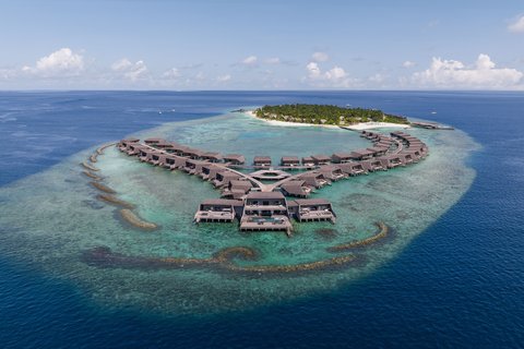 The St. Regis Maldives Vommuli Resort overlooks th