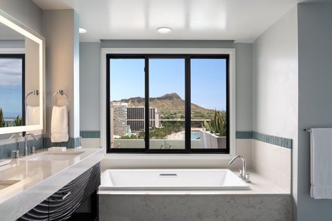 Relax in our deep soaking tub with ocean views